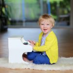 Child playing piano, Ridgefield house